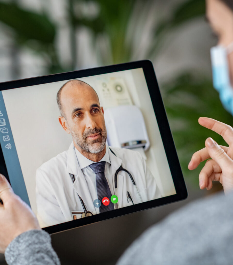 Sick patient in video conference with doctor